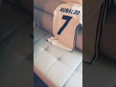 Real Madrid fan cries during taking t-shirt off from small Ronaldo